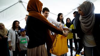 Photo number 2 from the photo gallery Prime Minister Justin Trudeau helps pack food baskets with Project Ramadan in Scarborough, Ontario