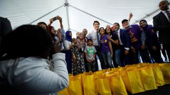 Photo number 3 from the photo gallery Prime Minister Justin Trudeau helps pack food baskets with Project Ramadan in Scarborough, Ontario