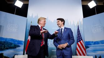 Prime Minister Trudeau shares a laugh with President Donald Trump.
