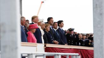 PM Trudeau and world leaders stand in the audience