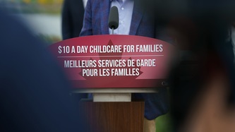 Podium sign: $10 a day childcare for families