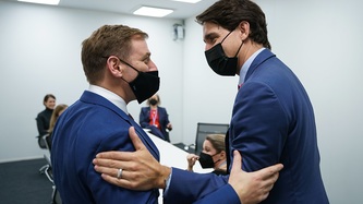 Prime Minister Trudeau and Premier Furey greet each other
