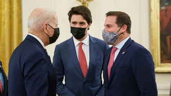 Prime Minister Trudeau, Minister Mendicino, and U.S. President Biden stand and look to each other