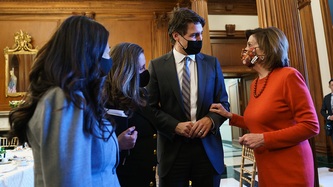 PM Trudeau, DPM Freeland, and Minister Ng look towards U.S. House Speaker Nancy Pelosi